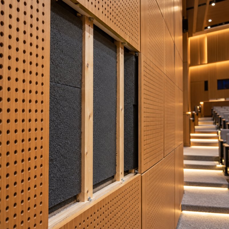 Behind perforated panels: sound insulation pads in Nepal